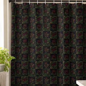 May include: A shower curtain featuring a dark, checkered pattern with alternating squares of deep green foliage and dark red floral motifs. The curtain is suspended from a black rod with silver rings, covering the bathtub area in a bathroom setting.