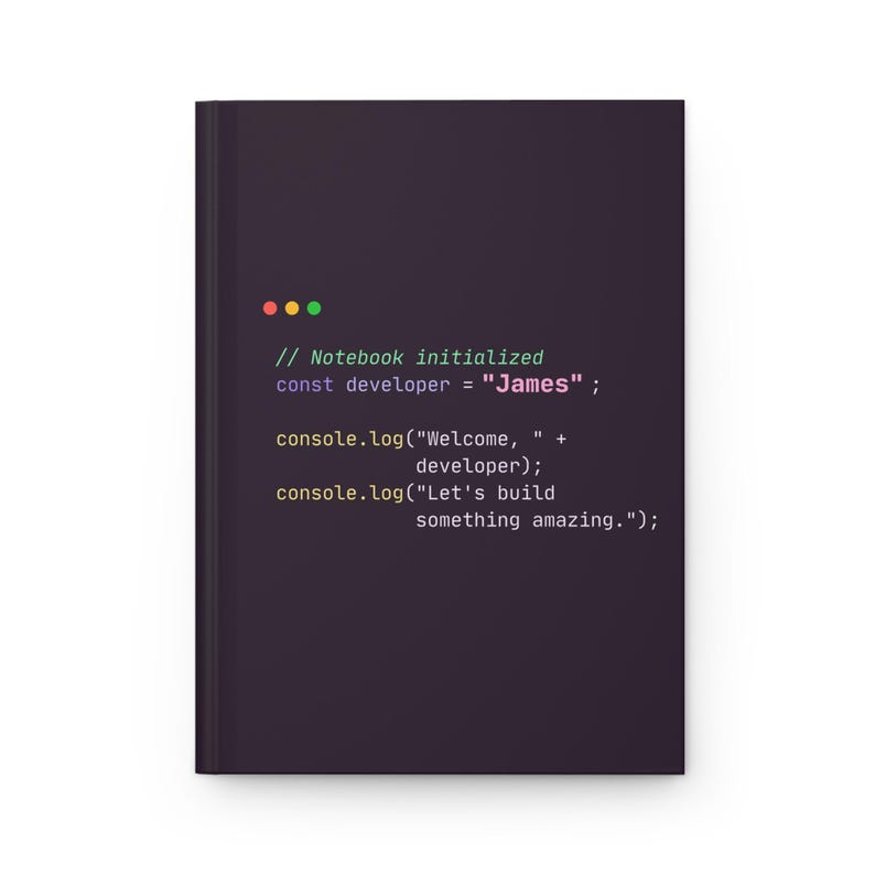 Puede incluir: Un cuaderno morado oscuro con un dise&ntilde;o de c&oacute;digo de programaci&oacute;n. El texto incluye "Notebook initialized", "const developer = James" y "Let's build something amazing." El cuaderno tiene una est&eacute;tica limpia y moderna.