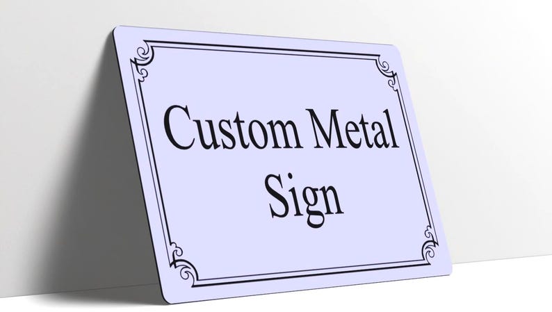 May include: A rectangular light blue metal sign with rounded corners and a black decorative border. The text Custom Metal Sign is printed in the center in a black serif font. The sign is positioned at an angle against a white surface.
