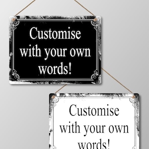 May include: Two rectangular signs with the text "Customise with your own words!" are displayed. One sign is black with white text, the other is white with black text. Both have decorative borders and are suspended by twine.