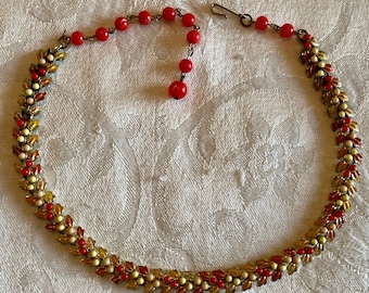 Fun vintage chocker necklace, lots of small red/yellow/white beads, enameled leaves