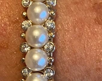 Vintage bracelet, latching bangle bracelet, lovely faux pearls & clear rhinestones, safety chain