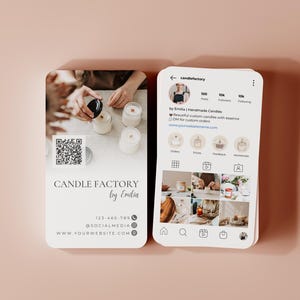 May include: Two business cards and a smartphone mockup on a pink background. The business cards feature the text "CANDLE FACTORY by Emilia" and contact details. The smartphone displays an Instagram profile with candle-related images.