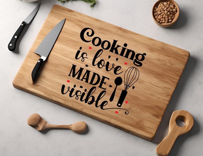 May include: A wooden cutting board with the text "Cooking is love made visible" and a whisk and spoon illustration.