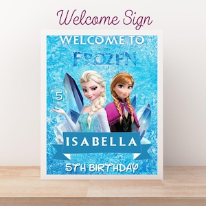 May include: A framed welcome sign featuring Elsa and Anna from Frozen. The sign reads "Welcome to Frozen" and includes the name "Isabella" and "5th Birthday". The background is a light blue icy texture.