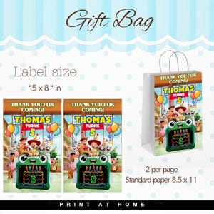 May include: A printable gift bag label measuring 12.7 by 20.3 cm, featuring a birthday theme with the text 'Thomas Turns 5' and 'Thank You For Coming'. The design includes cartoon characters and a green frog-shaped cake with five candles.