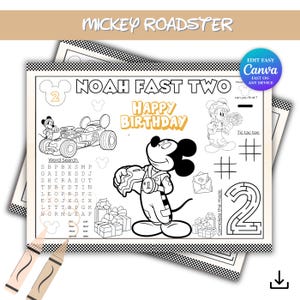 May include: A black and white Mickey Roadster themed placemat with the text "NOAH FAST TWO" and "HAPPY BIRTHDAY". Includes a word search, tic-tac-toe, and a maze. Two crayons are in the foreground.