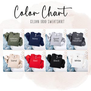 May include: Color chart showing ten different Gildan 1800 sweatshirt colors: Military Green, Navy, Sport Grey, Dark Heather, Sand, Red, Black, White.