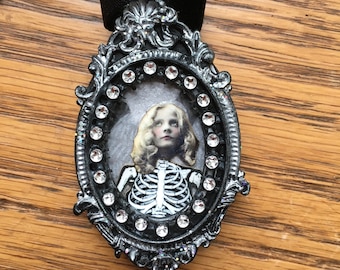 Macabre portrait ornament or necklace