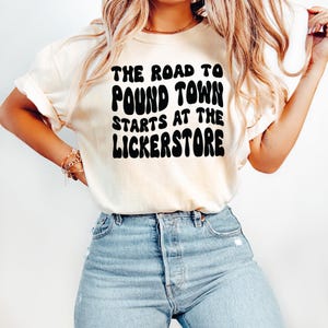 Funny Graphic Tee, The Road to Pound Town Starts at the Lickerstore Shirt, Humorous T-Shirt, Fun Slogan Top for Women
