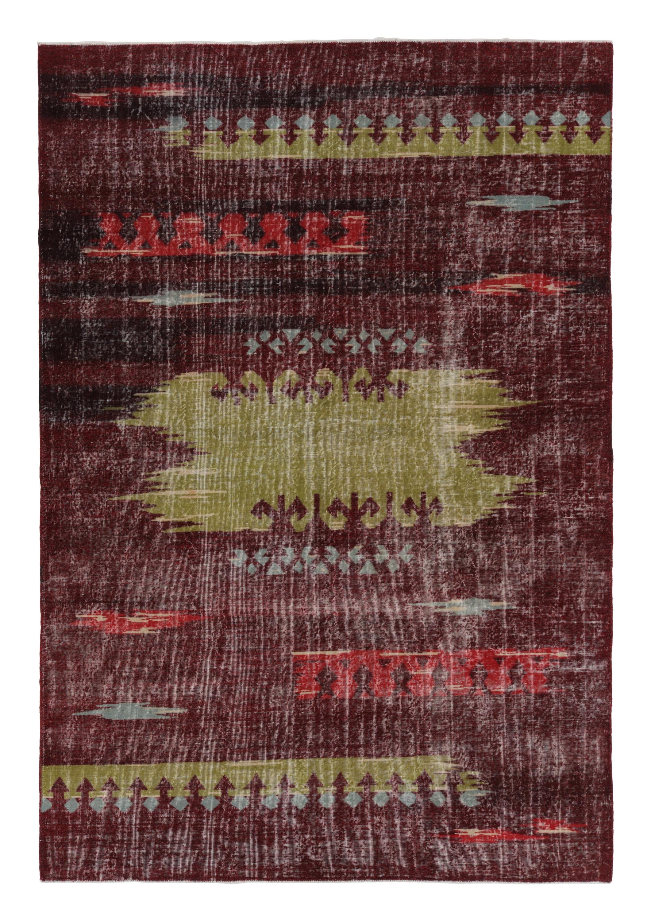 カラフルな幾何学模様が美しいヴィンテージのZeki Mürenラグ（赤