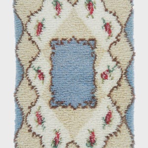 May include: A rustic wooden sign with the text "Welcome to our home" in white lettering. The sign features a distressed finish and a simple, inviting design, perfect for a front porch or entryway.