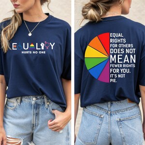 May include: A navy blue t-shirt with the text "EQUALITY HURTS NO ONE" on the front and a rainbow pie chart with the text "EQUAL RIGHTS FOR OTHERS DOES NOT MEAN FEWER RIGHTS FOR YOU. IT'S NOT PIE." on the back.