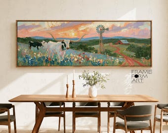 Op de afbeelding: Een panoramisch schilderij in een houten lijst met een witte longhorn koe in een veld met lupinen, een windmolen, een rode schuur en een zandpad onder een zonsonderganghemel. De tekst FRAME FORM ART is rechtsonder in de afbeelding zichtbaar.