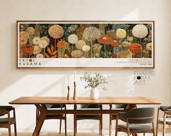 May include: A rectangular framed wall art print featuring a botanical illustration of various flowers in shades of orange, white, and green. The text reads Yayoi Kusama, Musee d'Art Moderne de la Ville de Paris, and Japan 1986.