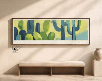 Op de afbeelding: Een horizontale ingelijste muurkunstprint met een abstracte botanische compositie van blauwe en groene cactusvormen tegen een lichtgele achtergrond. De tekst PARIS 2018 staat linksonder en AN ABSTRACT BOTANICAL COMPOSITION GALLERY LUMIERE rechtsonder.