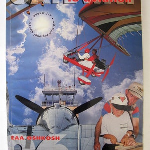 May include: A colorful brochure with the title "GATEWAY to aviation" and the text "EAA OSHKOSH 96" on the cover. The brochure features a red and white hang glider, a control tower, and a plane with a propeller.