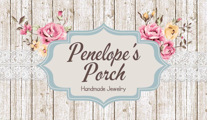May include: A light blue sign with a white background and the text "Penelope's Porch Handmade Jewelry" surrounded by pink and yellow flowers on a woodgrain background.