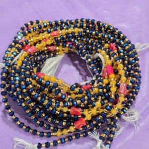 Cuentas africanas para la cintura hechas a mano: cuentas de vidrio azul marino y mostaza, ajustables.