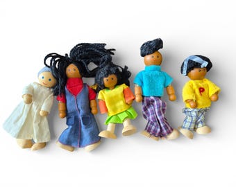 Conjunto familiar de muñecas flexibles de madera vintage