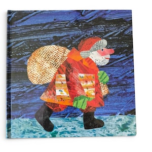 May include: A children's book cover featuring a colorful illustration of a person in a red coat and hat, carrying a large sack. The background is a dark blue with white and blue accents, suggesting a snowy scene. The person is walking on a blue surface.