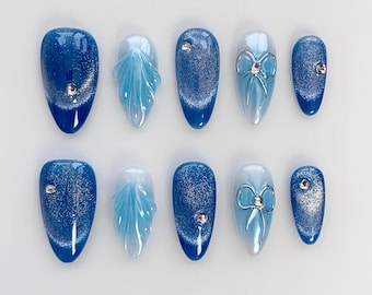 Aura Blue Cat Eye Press On Nails: Almond Bow Glitter Nails