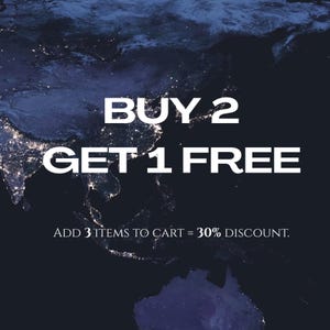 May include: A dark blue background with a map of the world, with bright lights representing cities. The text "BUY 2 GET 1 FREE" is in large white letters. Below, smaller text reads "ADD 3 ITEMS TO CART = 30% DISCOUNT."