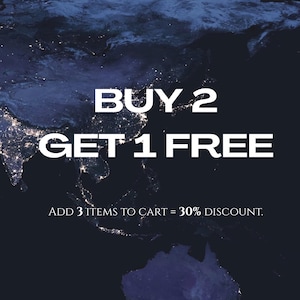 May include: A dark blue image featuring a world map. White text in a bold font reads "BUY 2 GET 1 FREE". Below, smaller text states "ADD 3 ITEMS TO CART = 30% DISCOUNT."