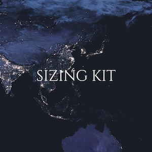 May include: A dark blue image of the Earth at night, with illuminated areas representing cities and towns. The white text "SIZING KIT" is prominently displayed, likely indicating a product or service related to size measurement.