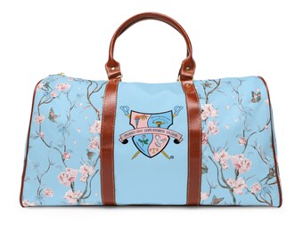 Gamma Phi Delta Crest Waterproof Travel Bag | Floral Duffle