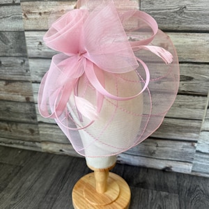 May include: A set of three ceramic mugs with a speckled, matte finish. The mugs are in shades of cream, light grey, and dark grey. Each mug has a simple, minimalist design, ideal for coffee or tea.