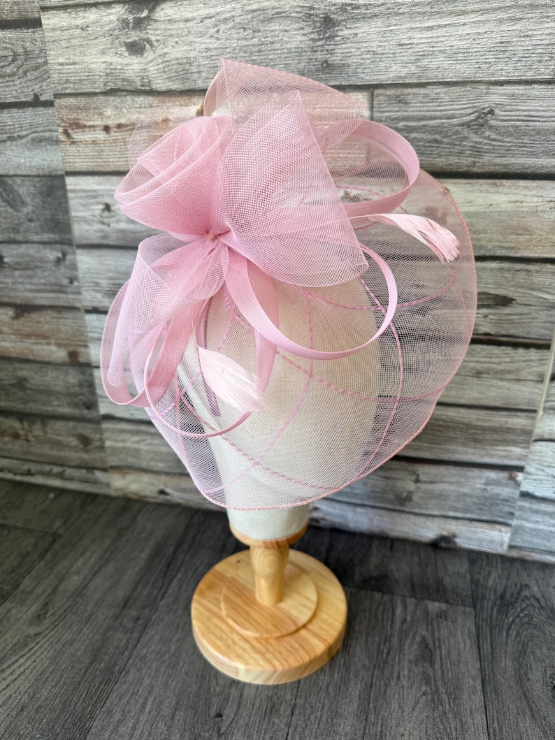 May include: A set of three ceramic mugs with a speckled, matte finish. The mugs are in shades of cream, light grey, and dark grey. Each mug has a simple, minimalist design, ideal for coffee or tea.