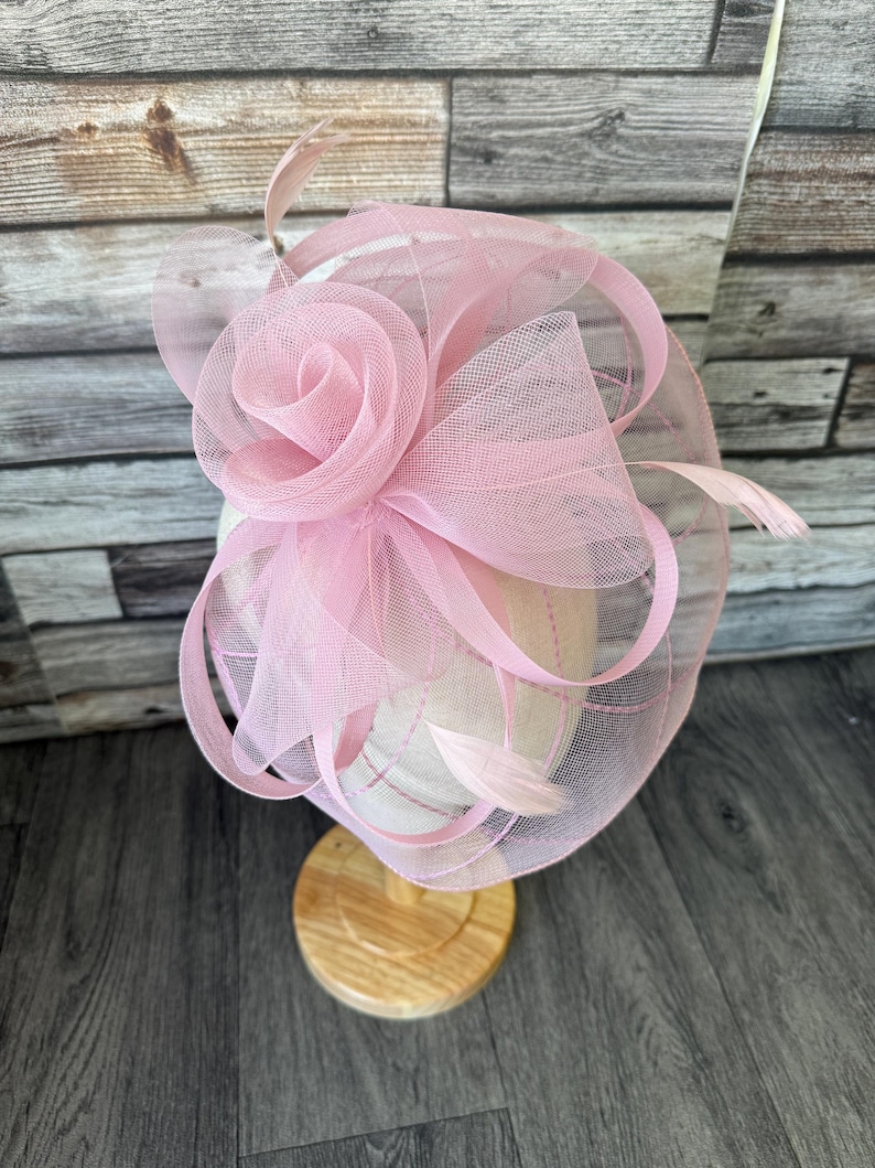 May include: A set of three ceramic mugs with a speckled, matte finish. The mugs are in shades of cream, light grey, and dark grey. Each mug has a simple, minimalist design, ideal for coffee or tea.