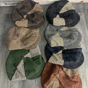 May include: A collection of eight newsboy caps in various colors and patterns. The caps feature a patchwork design with plaid and houndstooth fabrics. Colors include brown, black, green, gray, and navy.
