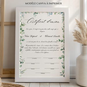May include: A framed wedding certificate in French, with the title "Certificat d'union". The white frame surrounds a document with floral watercolor accents and space for names and signatures. The text "MODÈLE CANVA À IMPRIMER" is at the top.
