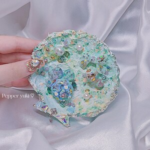 Merinia Green – Handcrafted 3D Shell Sculpture Art