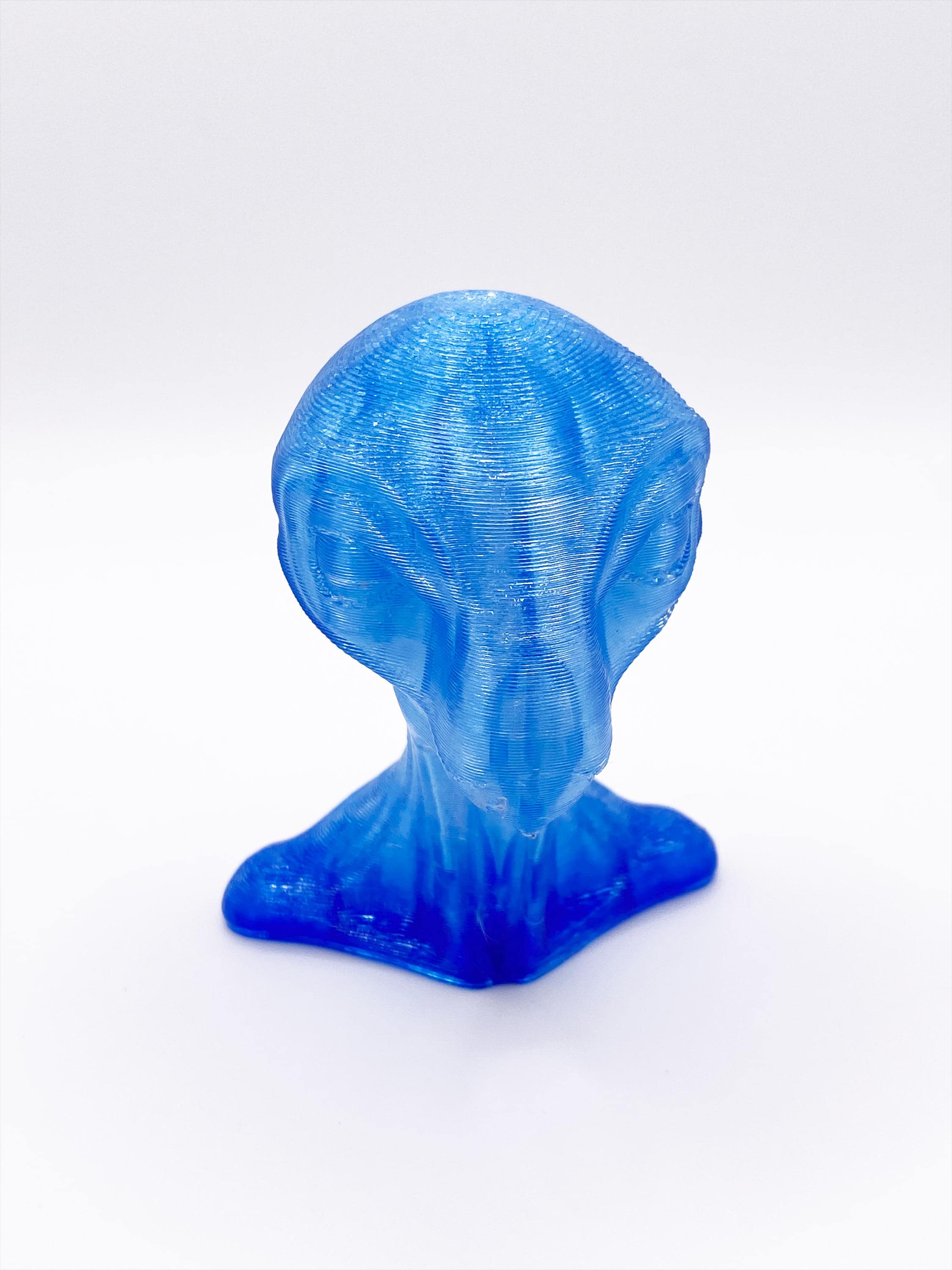 3D Printed Alien Bust: Translucent Blue Sci-Fi Figurine