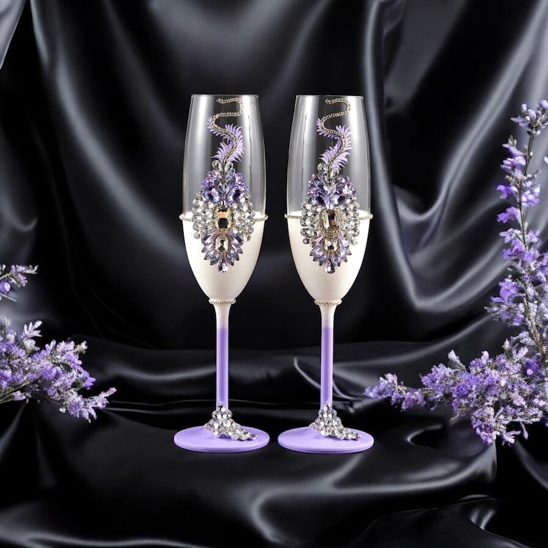 Purple-themed wedding reception supplies - plum champagne glasses