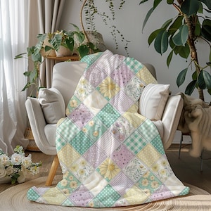 May include: A pastel patchwork quilt draped over a cream-colored armchair. The quilt features squares of various patterns, including floral, polka dot, and striped designs in shades of yellow, green, and lavender. The quilt is a cozy home decor item.