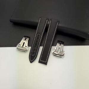 Svartvitt klockarmband i segeltyg med utfällbart spänne | Passar Omega, Tudor, Seiko, Rolex, Breitling, TAG Heuer med flera