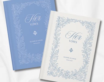 May include: Two wedding vow books, one light blue and one off-white, with floral frame designs. The text "Her Vows" is displayed in elegant script, with the names "Elodie & Louis" and the date "06.16.2026" below.