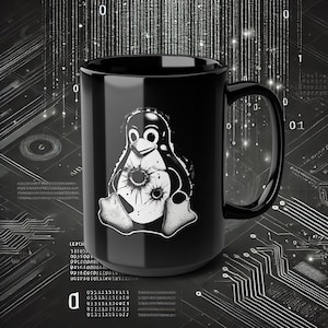 May include: Black ceramic mug featuring a white and black penguin illustration with a target design. The mug has a large handle and a glossy finish. The background has a digital circuit board design with binary code.