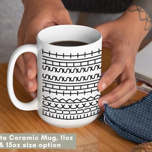 White ceramic hidden message mug with minimalist black pattern design that reveals a funny sarcastic phrase inside, perfect as an office humor gift for coworkers, bosses, friends, or Secret Santa exchanges.