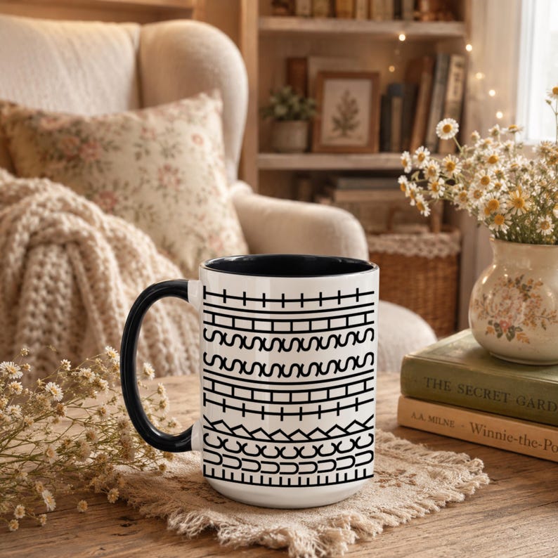White ceramic hidden message mug with minimalist black pattern design that reveals a funny sarcastic phrase inside, perfect as an office humor gift for coworkers, bosses, friends, or Secret Santa exchanges.