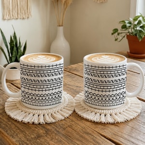 White ceramic hidden message mug with minimalist black pattern design that reveals a funny sarcastic phrase inside, perfect as an office humor gift for coworkers, bosses, friends, or Secret Santa exchanges.