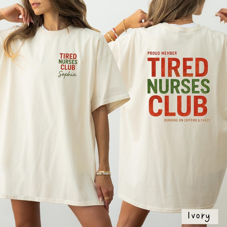May include: Ivory-colored t-shirts with the text "TIRED NURSES CLUB" in red and green. The front of the shirt has the text "Sophia" below the club name. The back of the shirt has the text "RUNNING ON CAFFEINE & CHAOS".