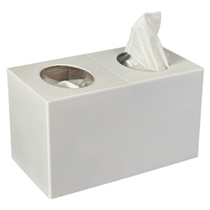 May include: White rectangular tissue box dispenser with two openings. One opening has a clear plastic window and the other has a white tissue peeking out.