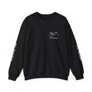 May include: Black crewneck sweatshirt with white text and graphics. The front features a line drawing of two hands making a pinky promise, with the words "PINKY PROMISE" below. The sleeves have the words "MY DIANNA" printed vertically.