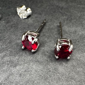 Ruby stud earrings in solid sterling silver