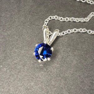 Deep blue sapphire in solid sterling silver necklace